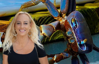 Stacy Lipton standing in front of her art