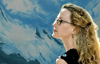 Kris Davis in front of her Painting